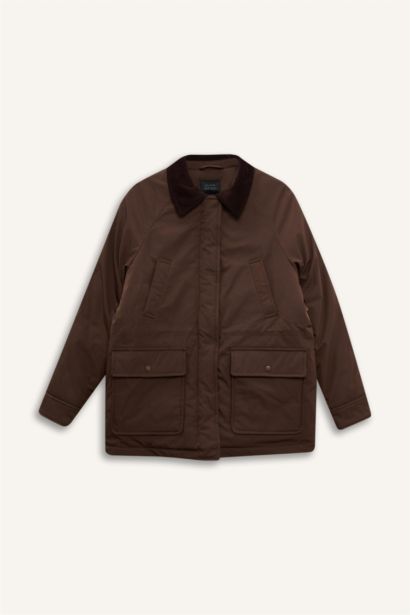 جاكيت طويل قصة عادية بياقة بولو