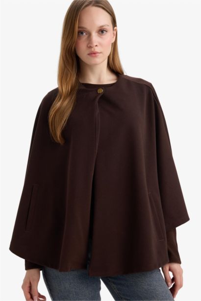 جاكيت عريض قصة عادية بياخة مستديرة