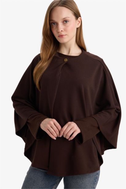 جاكيت عريض قصة عادية بياخة مستديرة