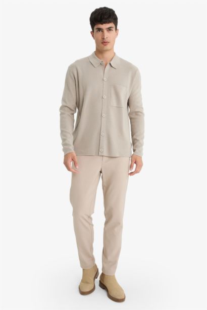 جاكيت تريكو قصة عادية بياخة بولو بجيب