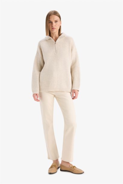 بلوز تريكو قصة مريحة وياخة عالية بسحاب