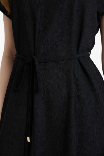 فستان اسود ميدي قصة عادية بياخة V