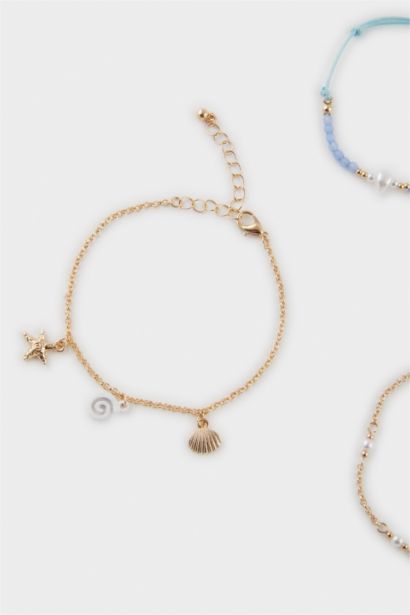 Woman 5 Piece Blue Beaded Gold Bracelet