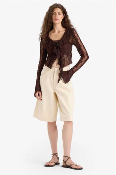 Blouse slim en dentelle à col V et manches longues