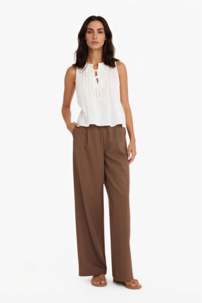 Blouse sans manches à noeuds sur le devant