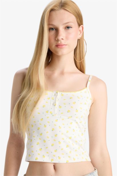 تانك توب سليم فيت مخصر بطبعة فاكهة بأزرار