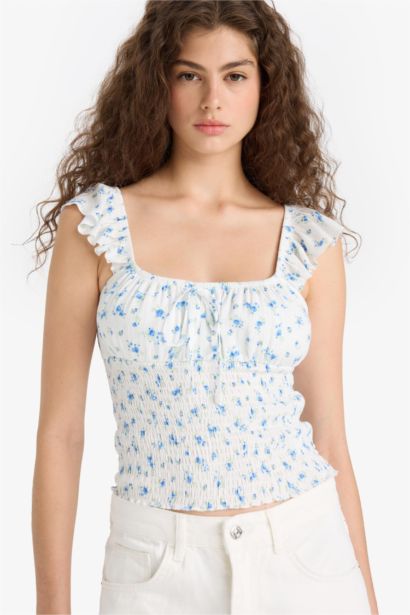 بلوزة نص ردن مخصر منسوج