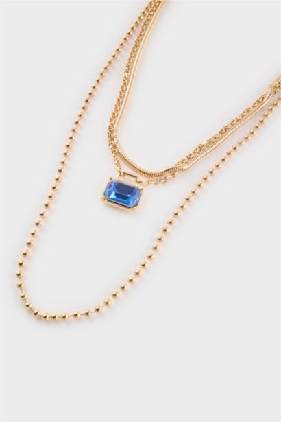 Collier femme doré avec pierre bleue