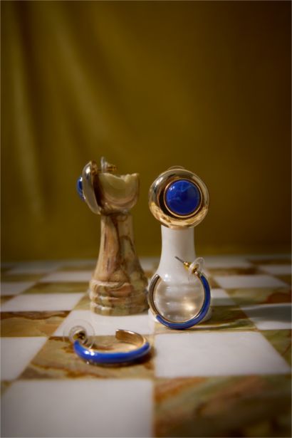 Woman 2 Piece Golden Earrings With Blue Stones