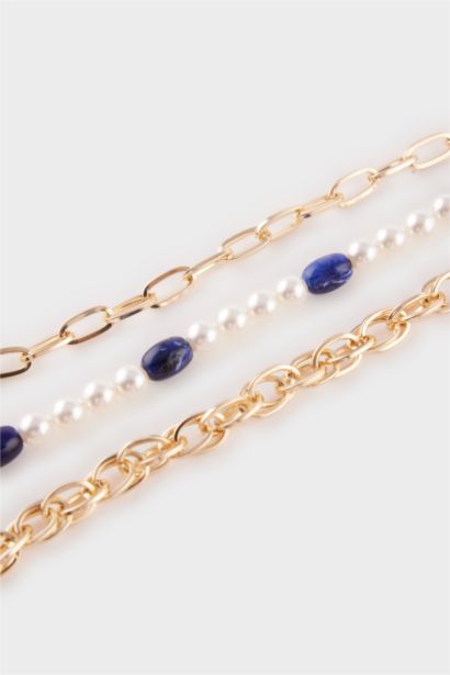 Woman 5 Piece Golden Bracelets With Pearls