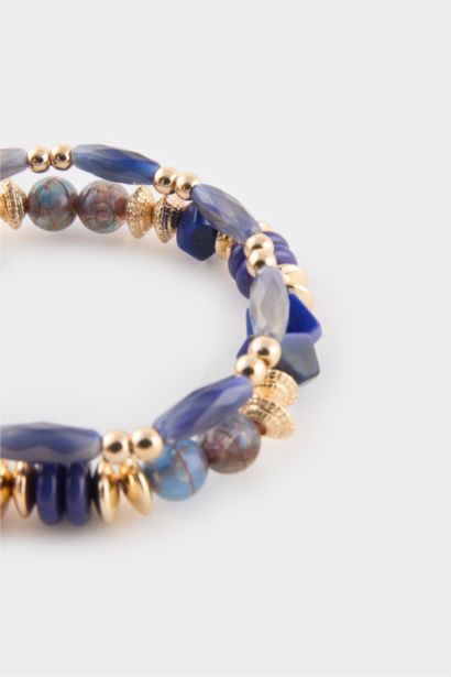 Woman 2 Piece Bracelets With Blue And Golden Stones