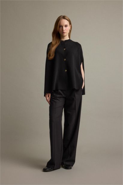 جاكيت تريكو قصة عادية بياخة مستديرة