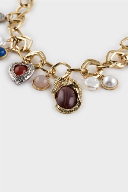 Collier doré à charms et pierres colorées pour femme