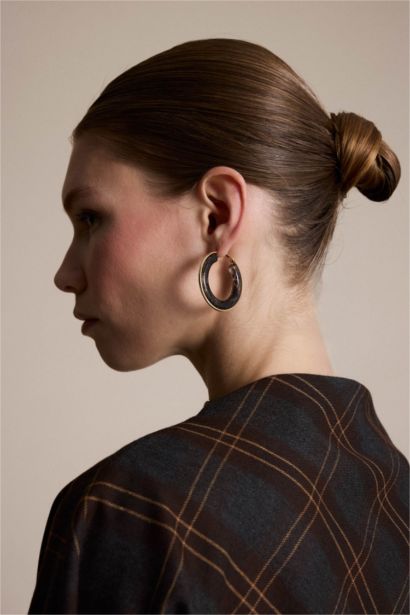 Boucles d’oreilles dorées pour femme