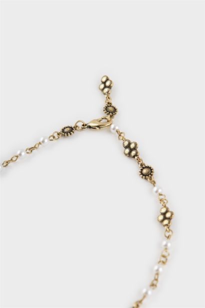 Woman Golden Necklace With Pearl Details