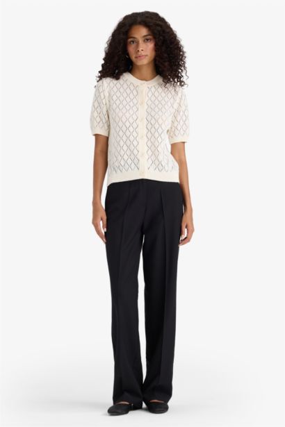 جاكيت تريكو قصة عادية بياخة مستديرة