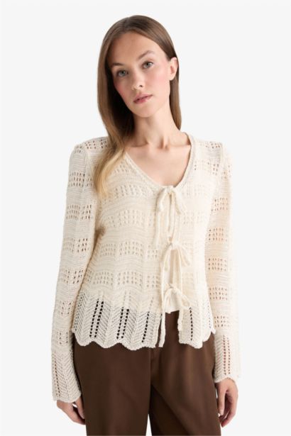 سترة تريكو قصة عادية بياقة V