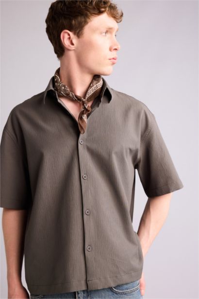 قميص نص ردن بوكسي فيت قماش كرنكيل