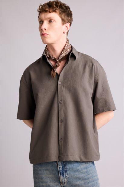 قميص نص ردن بوكسي فيت قماش كرنكيل