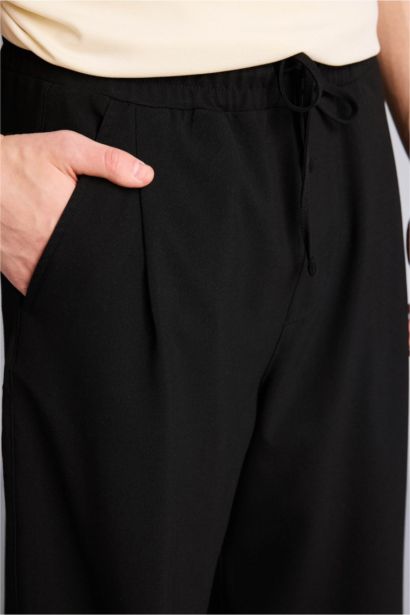 Pantalon droit large à poches Coupe barrel