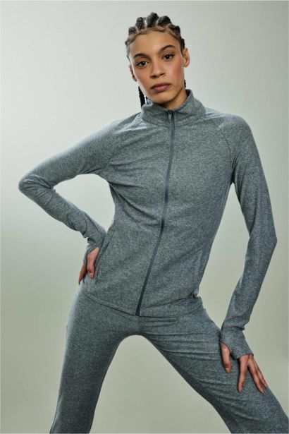 Top de sport zippé à col montant Coupe slim