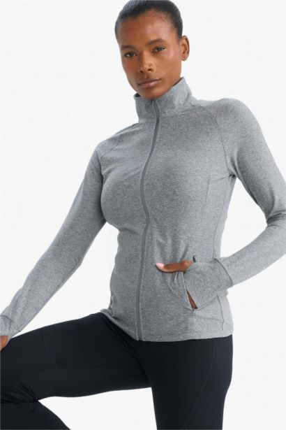 Top de sport zippé à col montant Coupe slim
