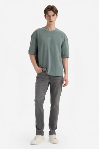 تيشيرت نص كم قصة فضفاضة برقبة مستديرة