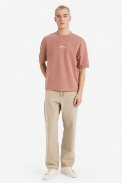 تيشيرت نص كم قصة فضفاضة قماش يسمح بمرور الهواء