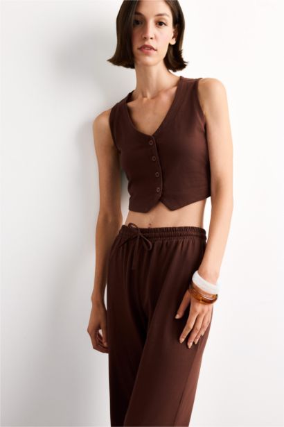 فانيلة مخصر بياقة بأزرار مخطط