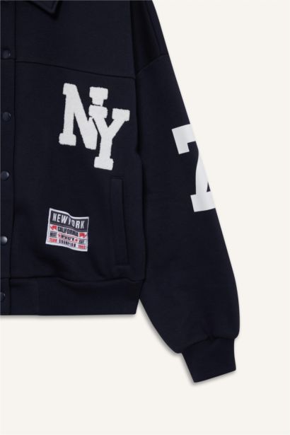 جاكيت بومبر بياقة بولو