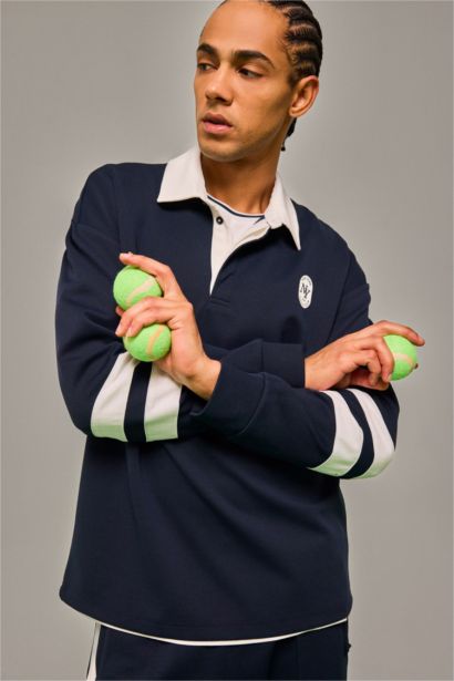 سويت شيرت رياضي اوفر سايز بياقة بولو