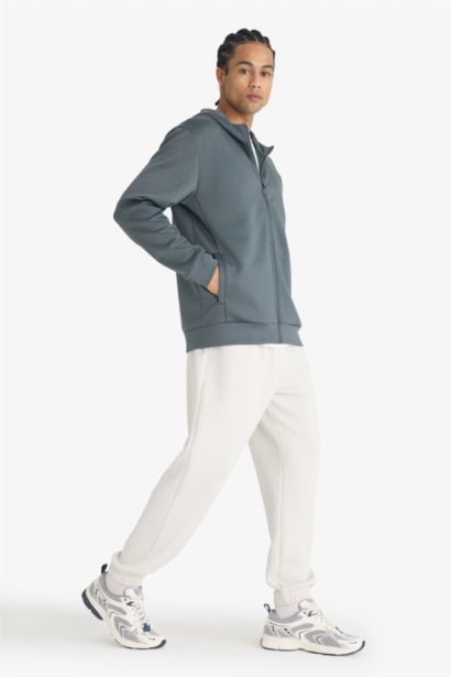 جاكيت رياضي قصة عادية بغطاء للرأس