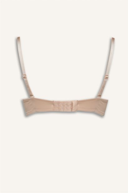 Бюстгальтер без бретелек на косточках с микро покрытием и половинным наполнением