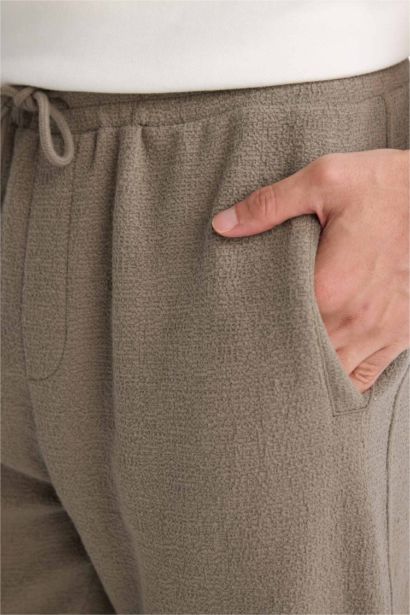 بنطلون قصة عادية وخصر برباط