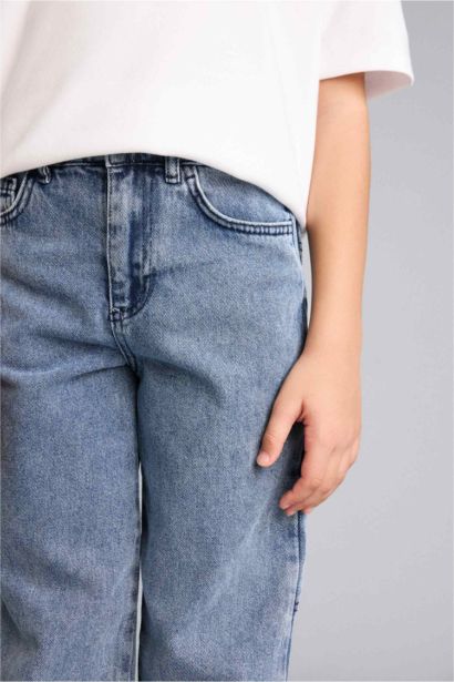 بنطلون جينز اولادي برجل عادية