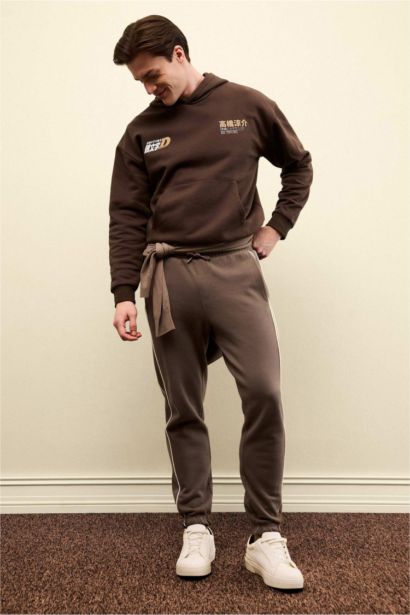 سويت شيرت مطبوع أوفر سايز بغطاء للرأس