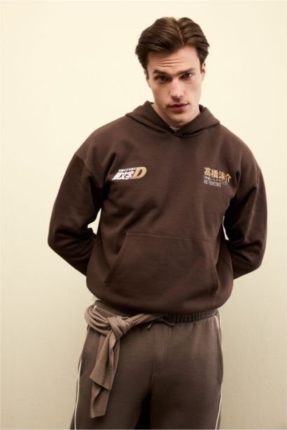 سويت شيرت مطبوع أوفر سايز بغطاء للرأس