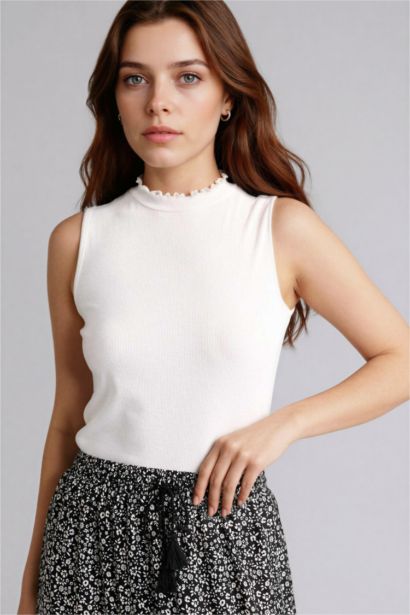 بلوزة كت سادة سليم فيت بياخة عالية