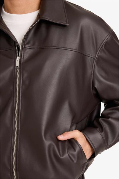 جاكيت جلد صناعي اوفر سايز بياقة قميص