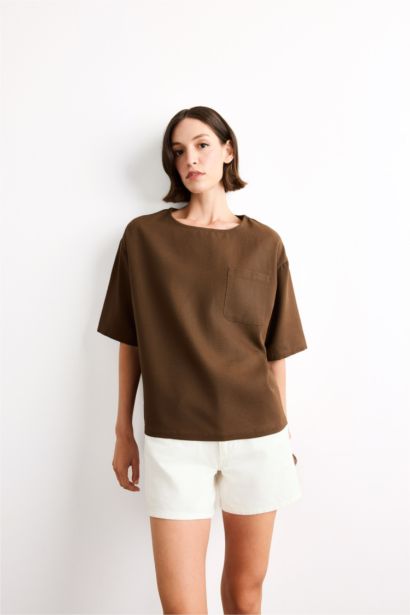 بلوزة نص ردن منسوج قصة مريحة بياخة مستديرة