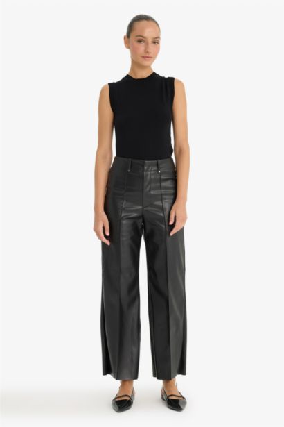 بلوزة كت مخصر بياخة مستديرة