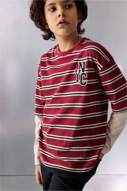 تيشيرت مخطط ولادي ردن طويل قصة عادية بياخة مستديرة