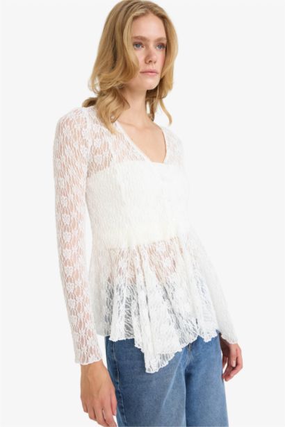 Blouse en dentelle boutonnée à col en V et manches longues