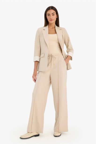 Pantalon taille haute jambes larges avec poches