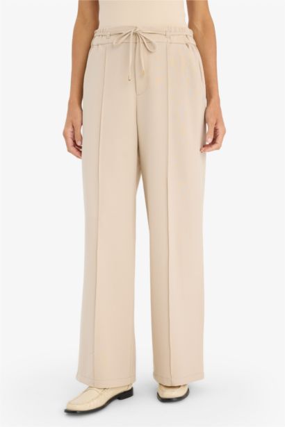 Pantalon taille haute jambes larges avec poches