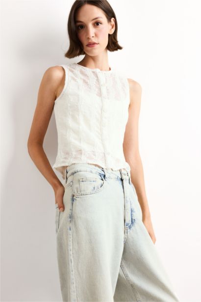 بلوزة كت قطن بياخة مستديرة