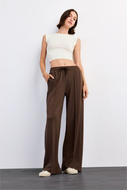 بنطرون منسوج قصة مريحة برجل عادي وخصر عادي