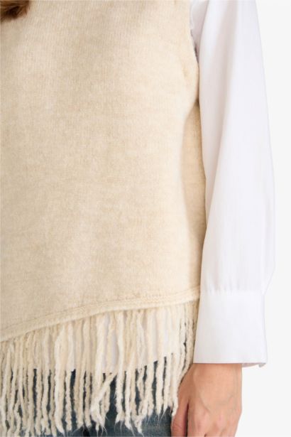 Pull sans manches oversize à franges