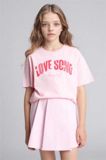 تيشيرت بناتي نص كم بطبعة شعار اوفر سايز