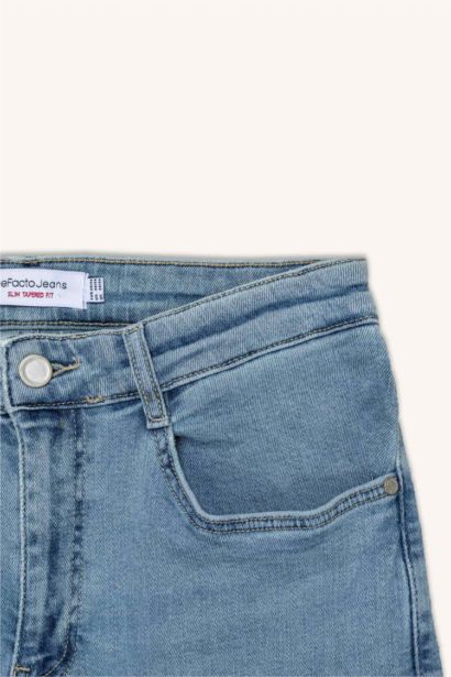 بنطلون جينز سليم فيت برجل ضيقة